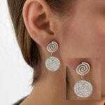 Σκουλαρίκια Swirl ασημί χρώμα